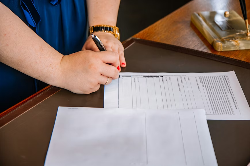 A lady filling forms